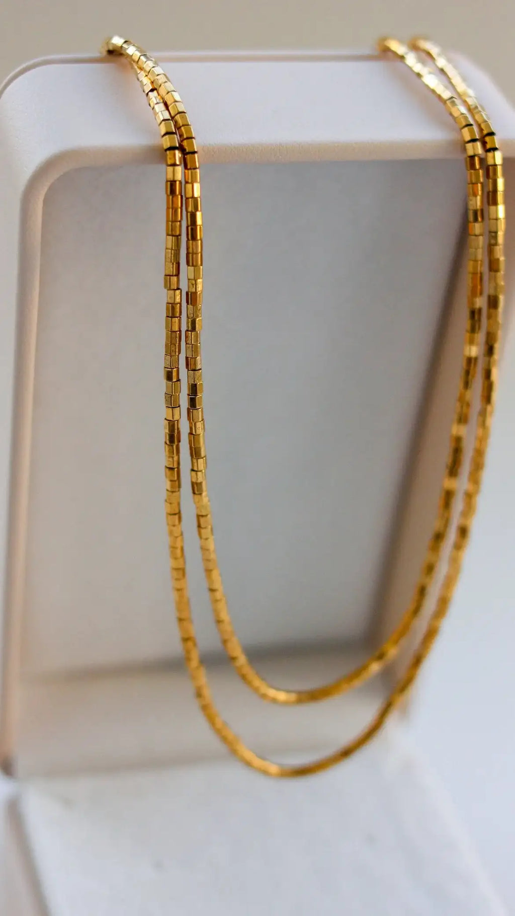 Colar Raio de Sol em Hematitas | linha ouro 18k