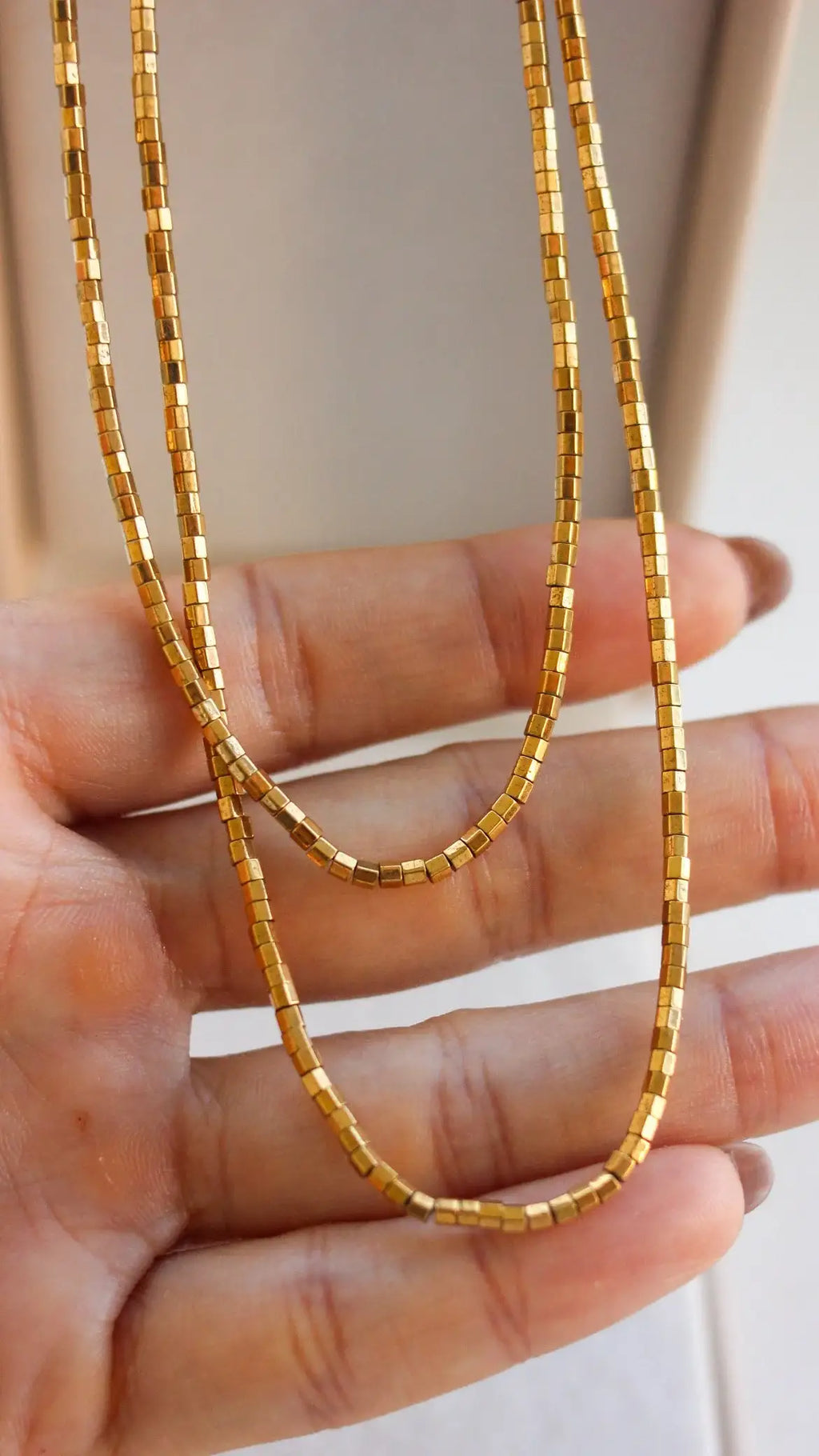 Colar Raio de Sol em Hematitas | linha ouro 18k